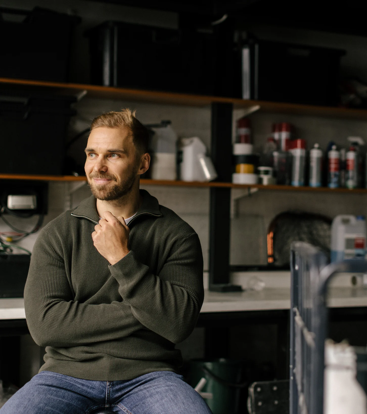 Man seated in a workshop